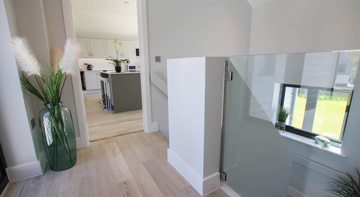 The stairs lead down to the ground floor bedrooms. 