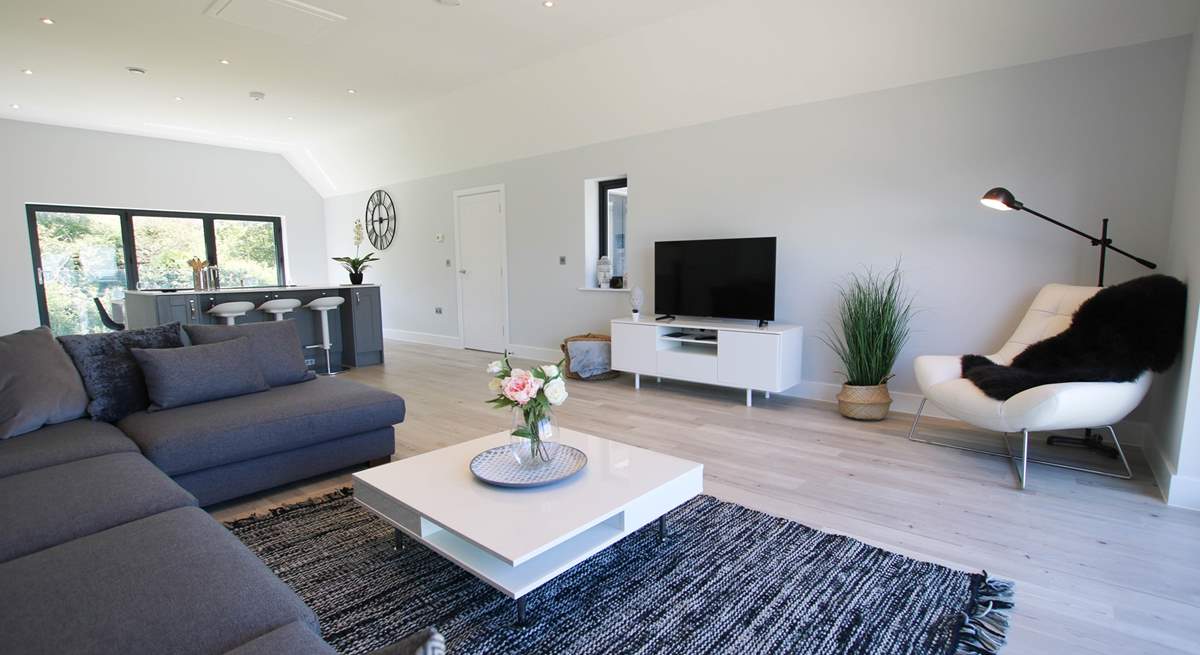 Contemporary furnishings in the open plan first floor living area. 