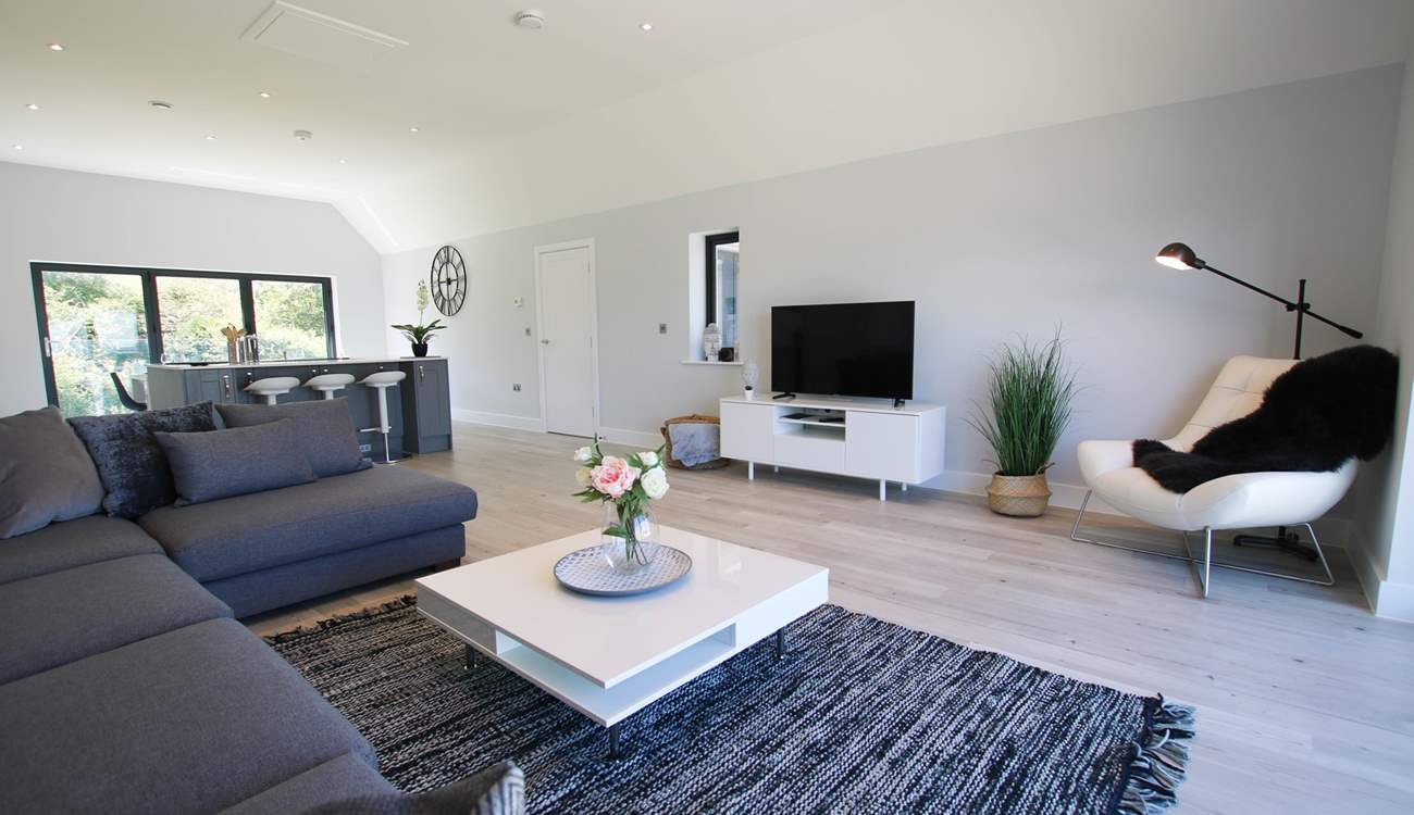 Contemporary furnishings in the open plan first floor living area. 