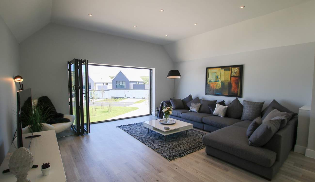 Bi-fold doors to the front let in the light. 