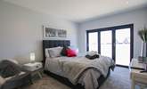 The bedrooms are elegantly furnished with comfort in mind.  - Thumbnail Image