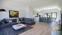 Cuddle up on the sofa and catch a movie on the Smart TV.