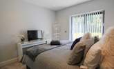 This bedroom has a TV. - Thumbnail Image