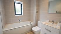 The family bathroom for a long soak after a busy day surfing!