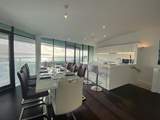 The elegant dining area and stylish kitchen.