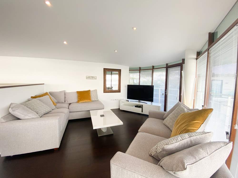 Cosy up on the sofa and catch a movie on the Smart TV.