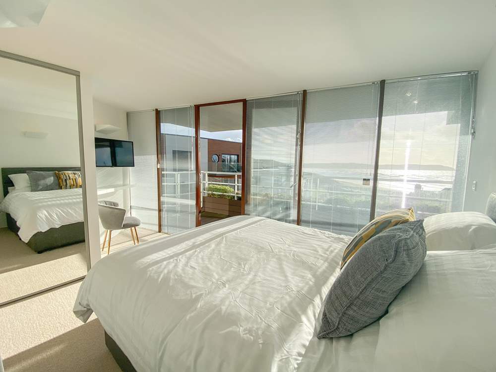 The gorgeous principal bedroom has an en suite bathroom.