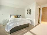 Neutral tones await in this tranquil bedroom.