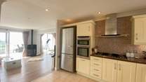 The stylish kitchen has all the equipment you'll need. Please note the gas fire is currently unavailable.