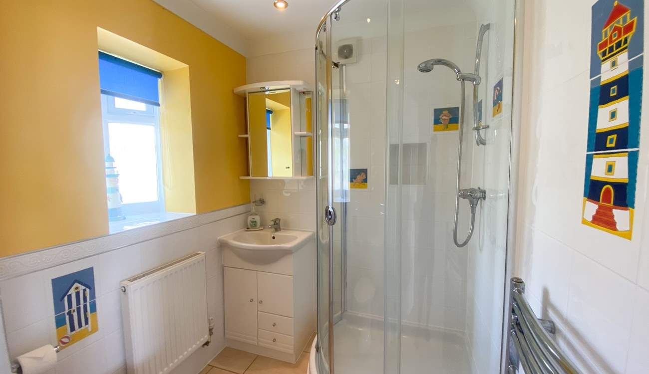 The en suite shower-room to the twin bedroom. 