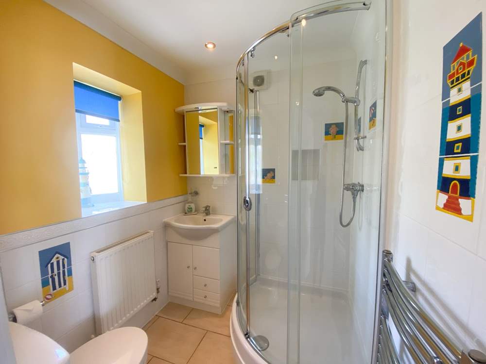 The en suite shower-room to the twin bedroom.