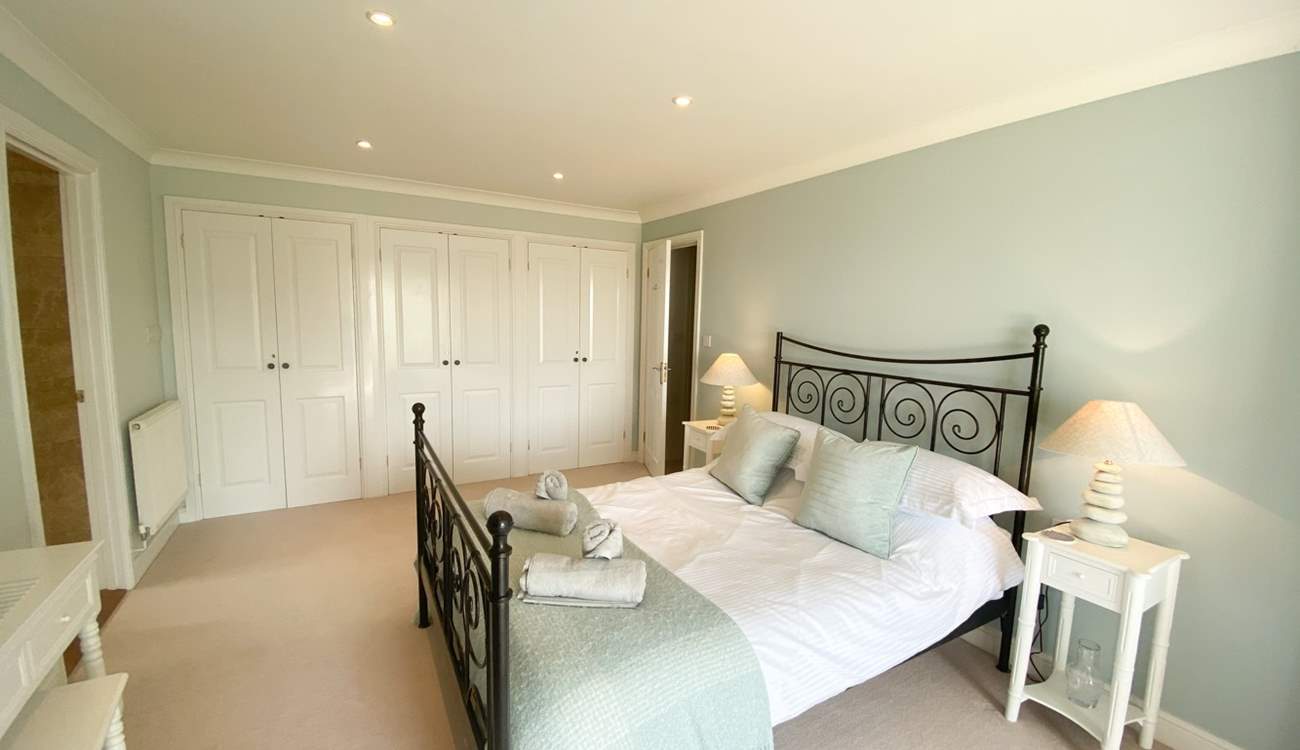 Pretty pastel shades match the seaside location here. 