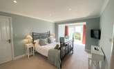This gorgeous bedroom has access to the garden.  - Thumbnail Image