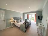 This gorgeous bedroom has access to the garden.