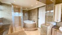 Soak in the corner bath or have a refreshing shower, you choose!