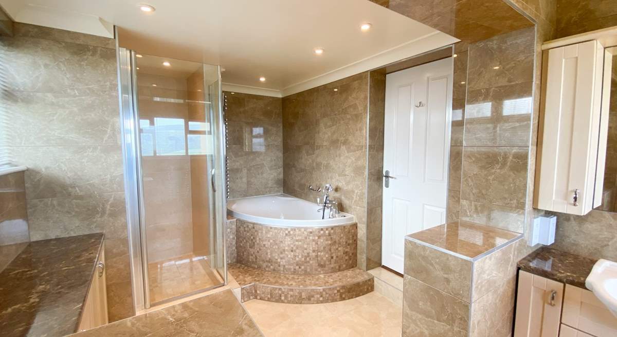 Soak in the corner bath or have a refreshing shower, you choose!