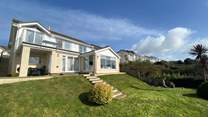 Enjoy the back garden with views out across the coast.