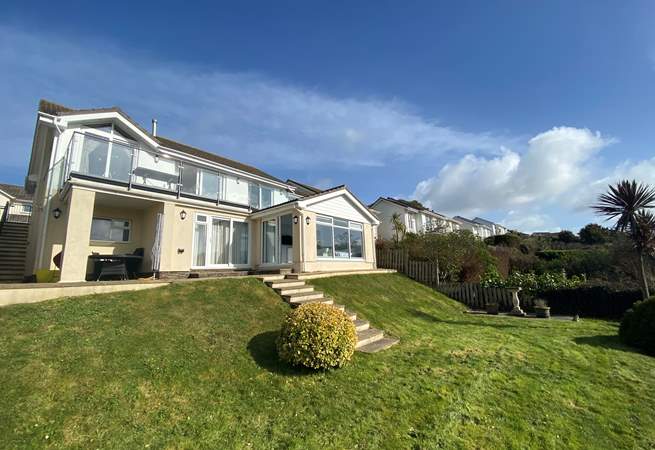Enjoy the back garden with views out across the coast.
