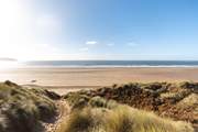Families can enjoy miles of golden sand, ideal for beach games.