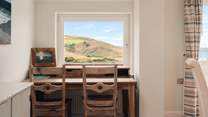 You will also find a handy desk area, ideal if work comes calling. 