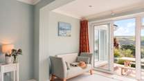 Pretty pastel shades match the seaside location here. 