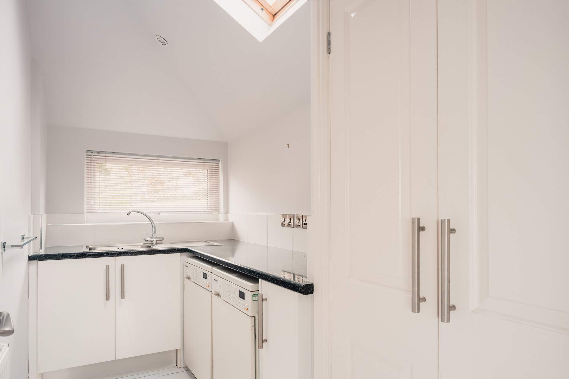 There's even a handy utility-room housing a washing machine and tumble-drier.