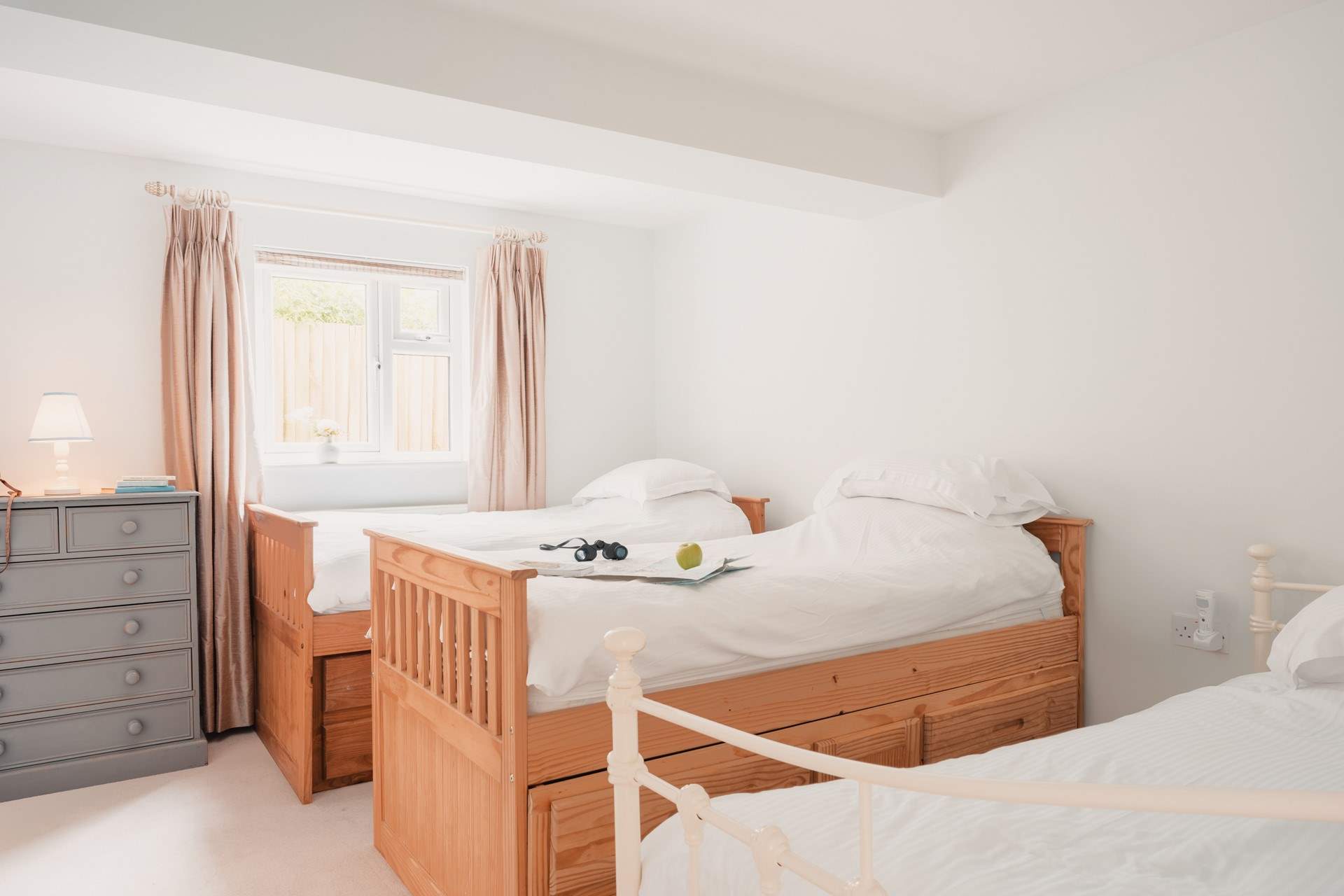 Bedroom 3 has twin beds and an additional day bed, suitable for children only. This room also has an en suite shower-room. 