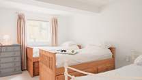 Bedroom 3 has twin beds and an additional day bed, suitable for children only. This room also has an en suite shower-room. 