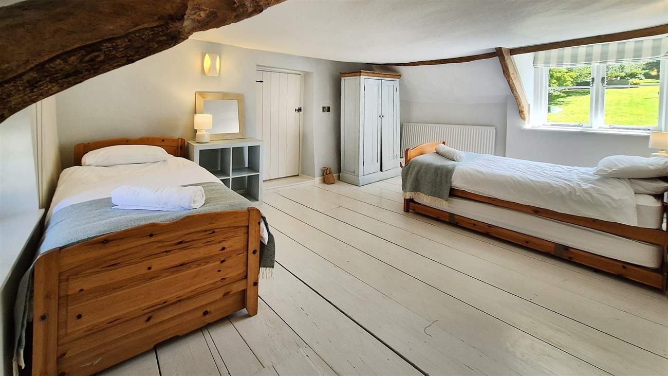 This bedroom has twin beds with trundle beds under - suitable for children only.