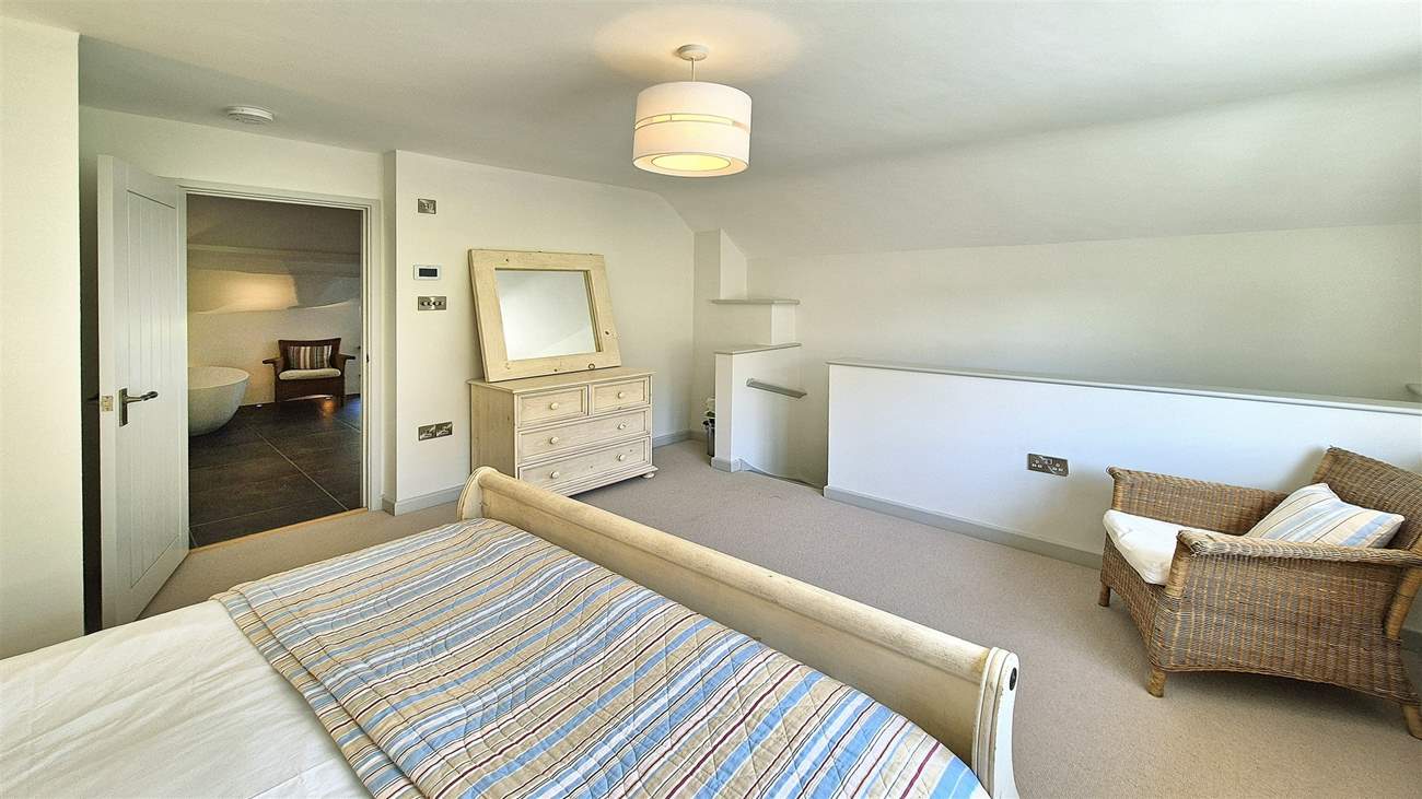 And a wonderful en suite bathroom with free-standing bath and shower.