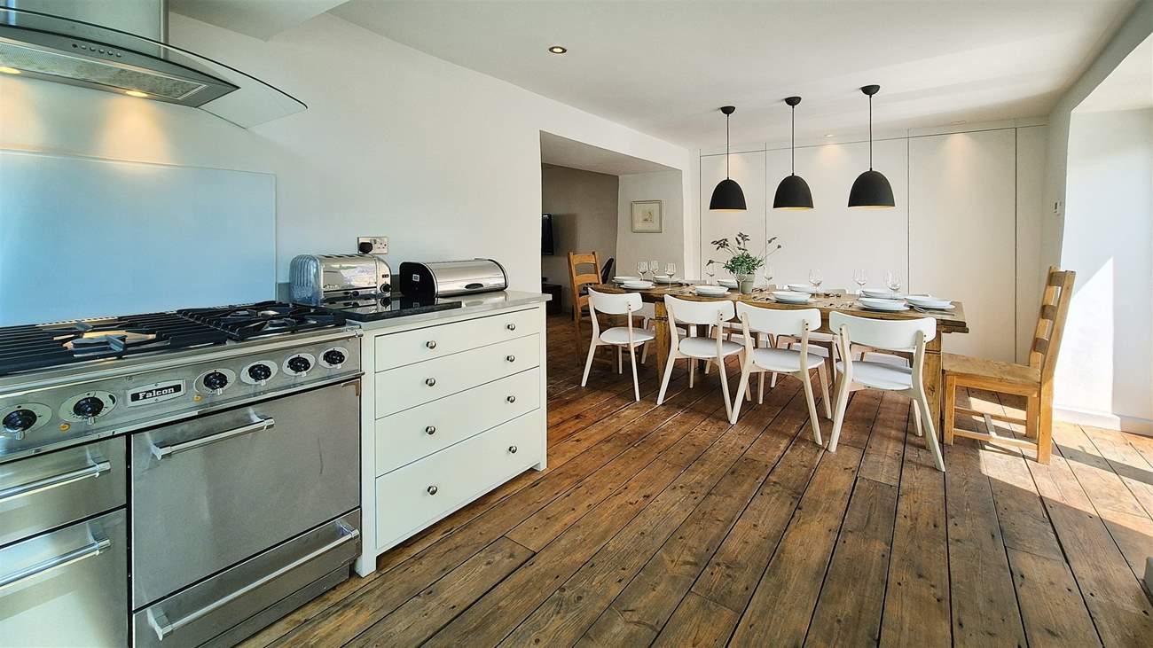 Beautifully styled statement lighting makes the room.