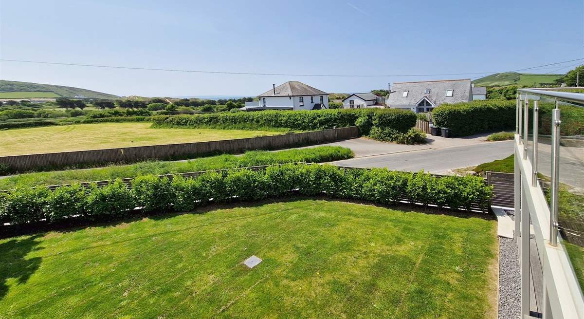 The view towards the sea from the balcony takes in the sand dunes and countryside. 