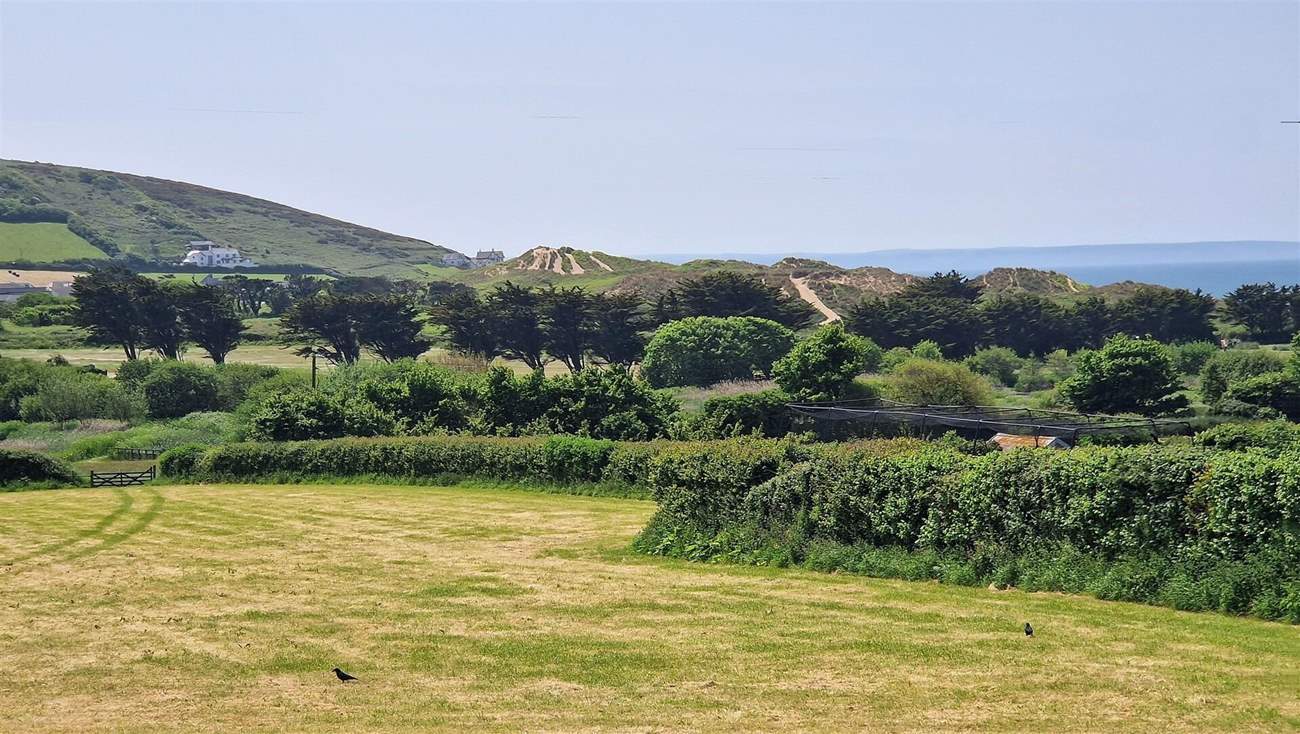 The sand dunes and sea are a stroll away.