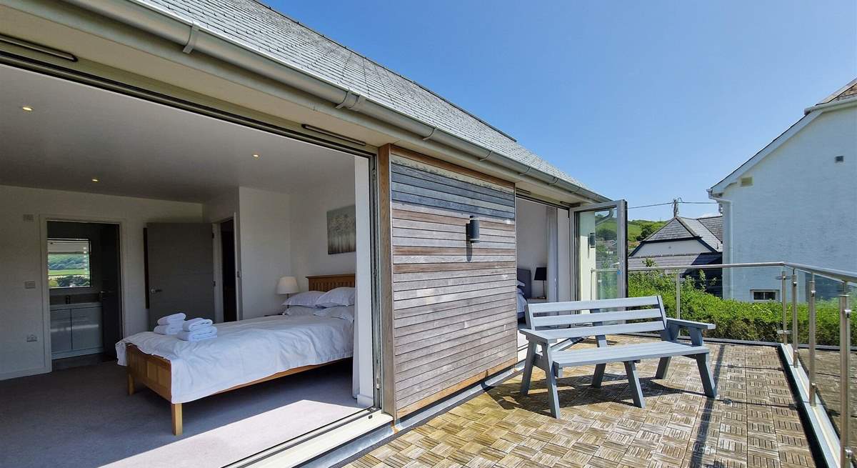 These two bedrooms share this wonderful balcony.