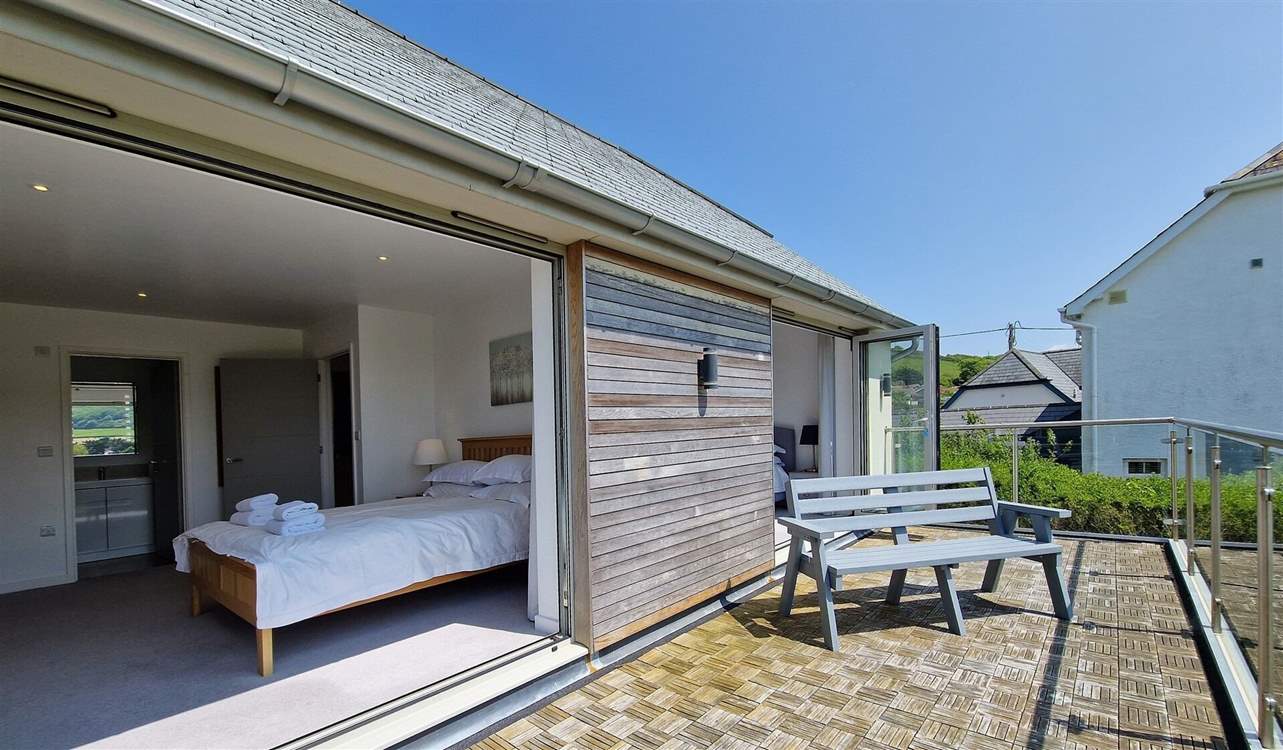 These two bedrooms share this wonderful balcony.