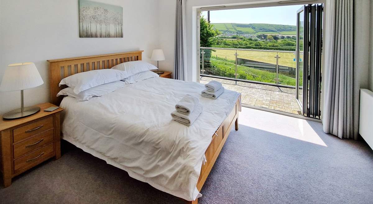 Lovely linens adorn the beds. 