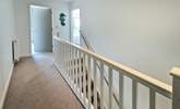 Three bedrooms are located on the first floor.  - Thumbnail Image