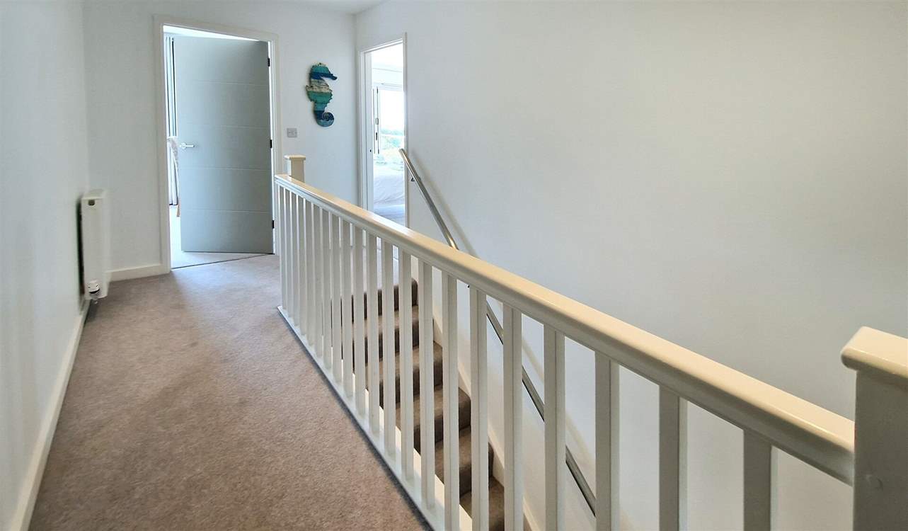 Three bedrooms are located on the first floor.