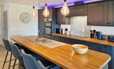 Perch at the breakfast-bar and chat with the chef.  - Thumbnail Image