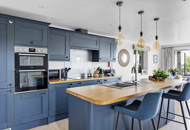 Perch at the breakfast-bar and chat with the chef. 