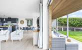 The ground floor flows seamlessly from indoors to outdoors.  - Thumbnail Image