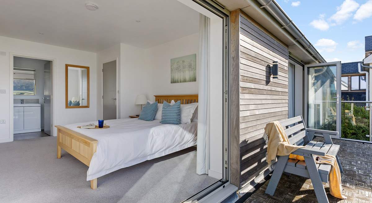 The balcony is shared by the two king bedrooms that sit to the front of the house with costal views.