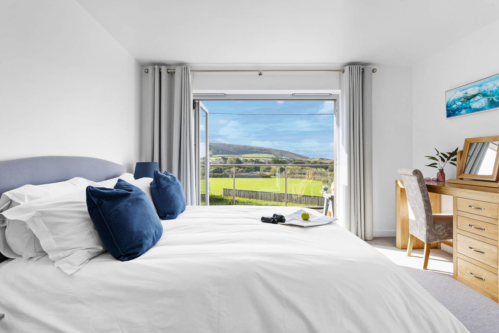 With views out to the beach and sand dunes you have the perfect spot to take in the ever changing picture window.