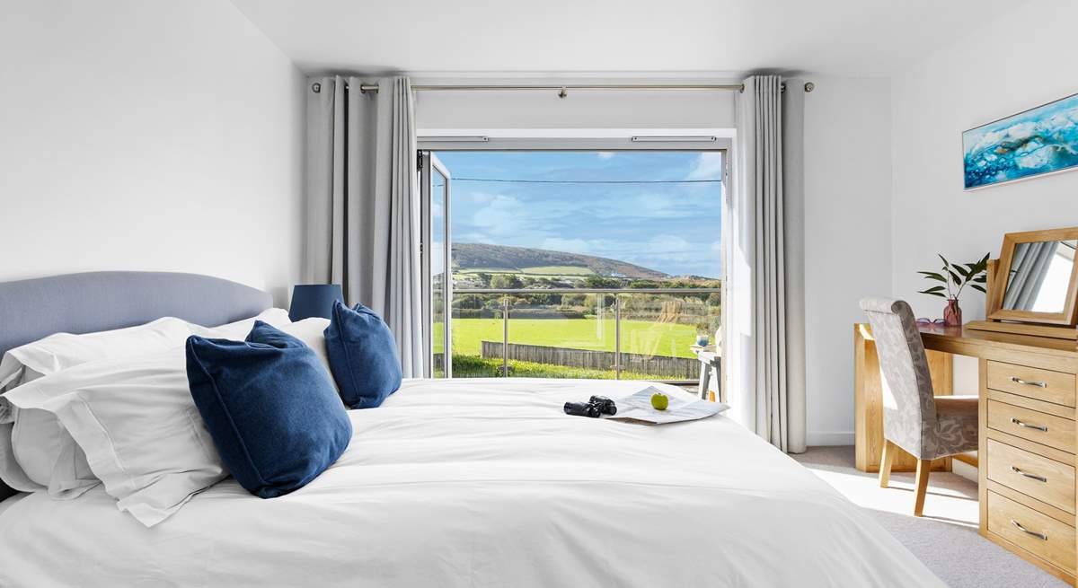 With views out to the beach and sand dunes you have the perfect spot to take in the ever changing picture window.