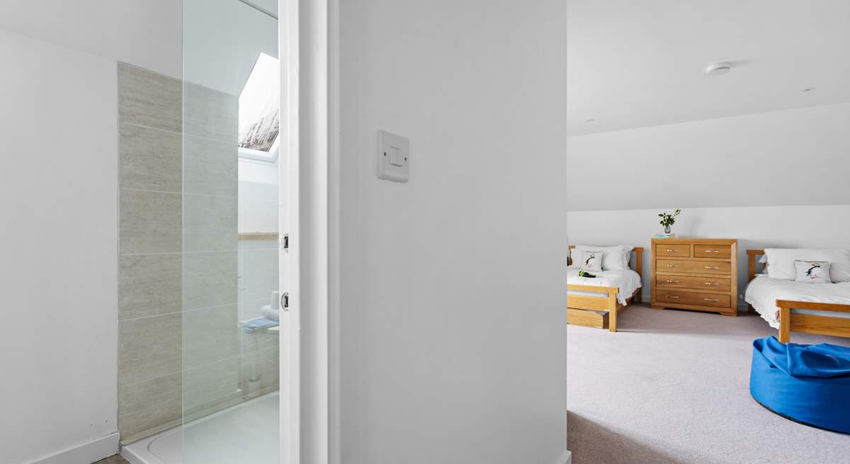 The en suite shower room is also spacious and bright.