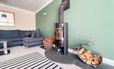 The warming wood-burner makes this holiday home ideal throughout the seasons.  - Thumbnail Image