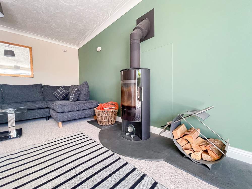 The warming wood-burner makes this holiday home ideal throughout the seasons.