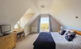 The bedrooms are nicely furnished. - Thumbnail Image