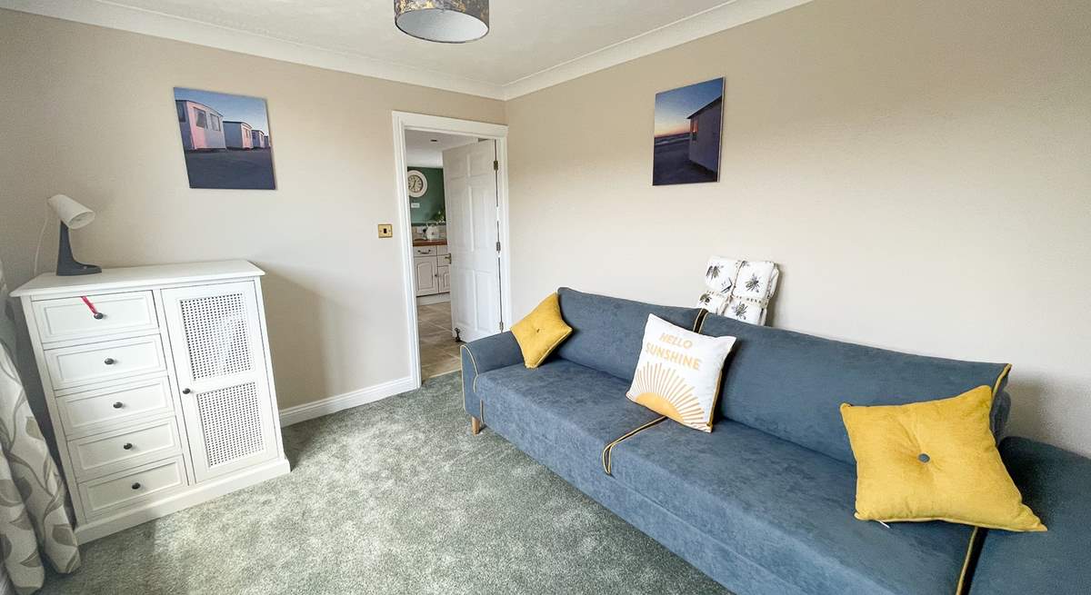 The second sitting-room is ideal for a quiet read or to catch up if work calls. 