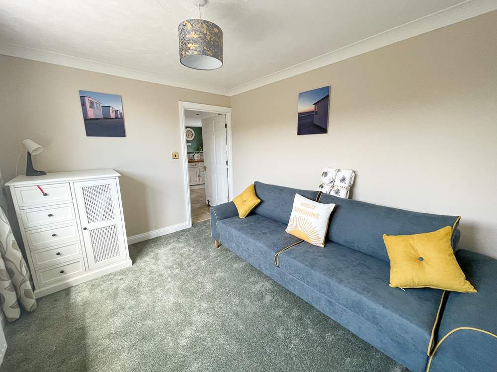 The second sitting-room is ideal for a quiet read or to catch up if work calls.